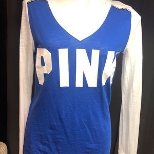 Pink long sleeve T-shirt.